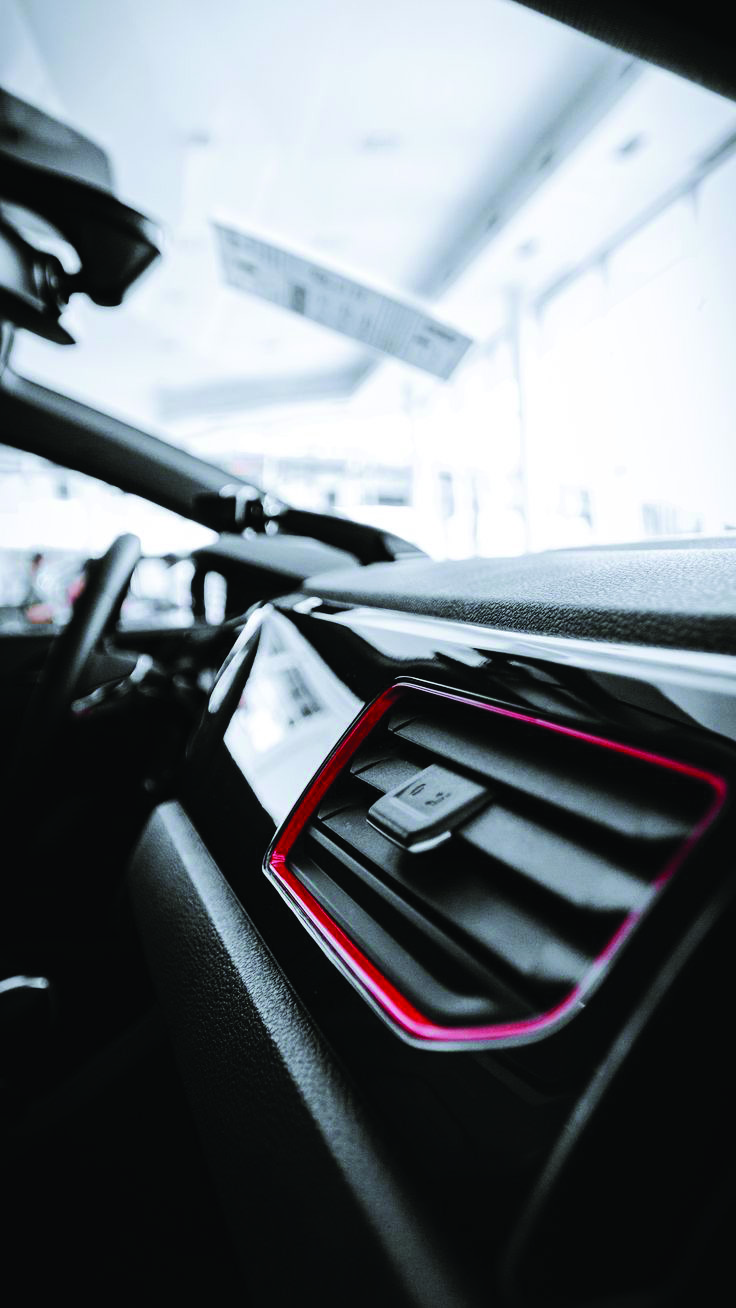 Interior vehicle screen and dashboard detail